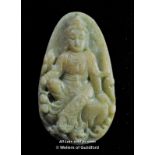 A Chinese green jade penadant carved with a buddha,7cm.