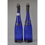 A pair of blue glass bottles with silver mounts and silver wine decanter labels, 'Teneriffe' and '