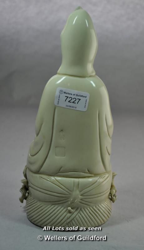 Chinese blanc de chine figure of a goddess seated on a lotus flower, impressed mark on back, 27cm. - Image 2 of 3