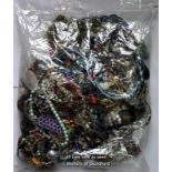 Bag containing costume jewellery, gross weight 4.66 kilograms