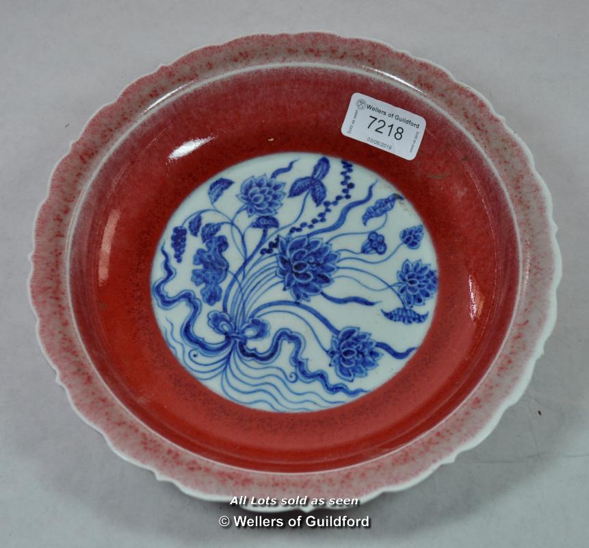 Chinese blue and white dish with plain red border, centre decorated with flowers, six character
