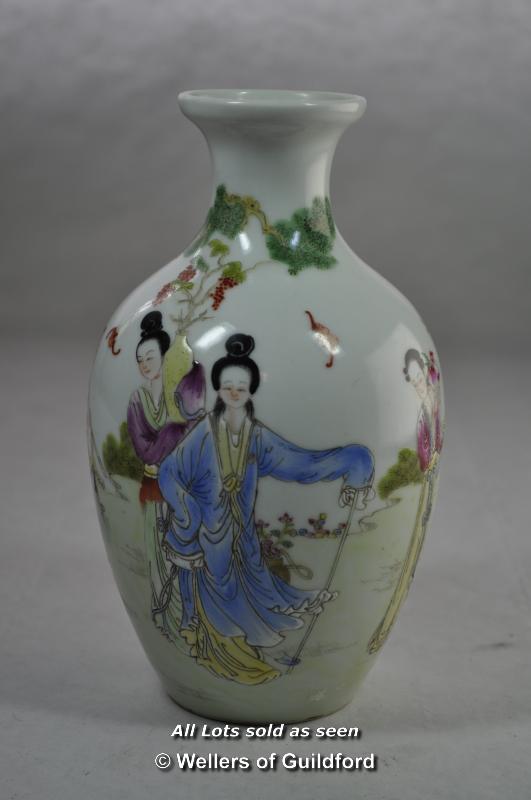 Chinese polychrome baluster vase decorated with figures in a garden, 17.5cm.