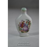 A porcelain snuff bottle painted with a courting couple.