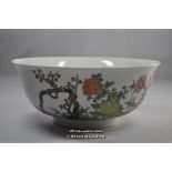 Chinese polychrome bowl decorated with birds and prunus, 21.5cm diameter.