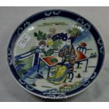 Chinese polychrome dish decorated with a lady seated in a garden, two blue rings to base, 22cm