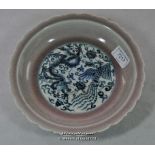Chinese blue and white dish with plain border, centre decorated with dragon and phoenix, six
