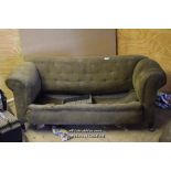 GREEN UPHOLSTERED CHESTERFIELD IN NEED OF RESTORATION