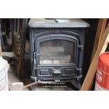 SMALL CAST IRON GAS BURNING STOVE