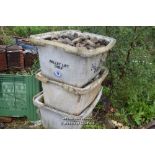 THREE PLASTIC TUBS FULL OF COBBLE SETTS