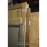 SIX MIXED VICTORIAN/EDWARDIAN MAINLY PINE DOORS INCLUDING TWO PANEL AND THREE PANEL DOORS