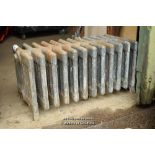 NINE BAR TWELVE COLUMN STUBBY CAST IRON RADIATOR, 720MM LONG