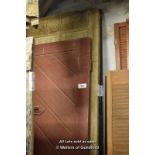 FIVE MIXED DOORS INCLUDING A PAIR OF PINE GLAZED DOORS, A VICTORIAN PINE FOUR PANEL DOOR AND A