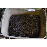 PLASTIC CRATE CONTAINING A LARGE QUANTITY OF HAND MADE VINTAGE NAILS