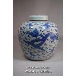 A Chinese blue and white ginger jar and cover, painted with phoenix and dragon, two blue rings to