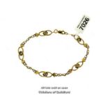 Fancy link bracelet, stamped as 18ct, weight 6.2 grams, length 20.5cm