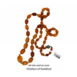 Butterscotch amber necklace, oval graduated beads, length 62cm, weight 22 grams