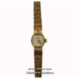 Ladies' Rotary 9ct gold wristwatch, small silvered dial with baton hour markers, presentation