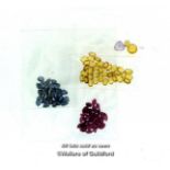 Quantity of loose gemstones, including yellow sapphires, blue sapphires and rubies