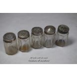 Five small salts or peppers with silver or plated lids.