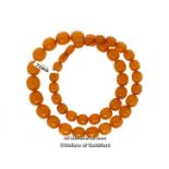 Baltic amber necklace, oval gratuated beads, length 65cm, weight 78 grams