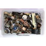 Box containing broken watches and watch parts