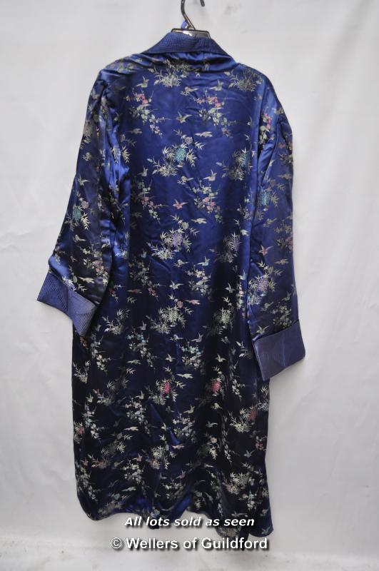 A mid 20th Century Chinese embroidered blue silk robe with collar, long sleeves and pockets. - Image 2 of 2