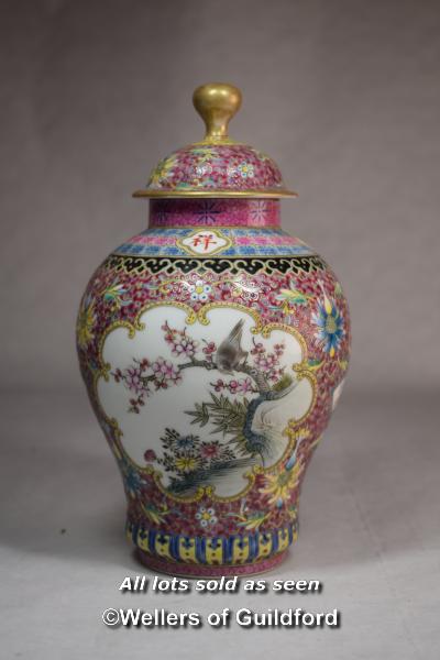 A Chinese polychrome vase and cover, with reserve panels decorated birds and prunus, 21cm. - Image 2 of 4