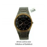 Gentlemen's Skagen Titanium wristwatch, circular black dial with gold coloured bezel, baton hour