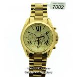 Michael Kors wristwatch, circular gold coloured dial with Roman numerals, date aperture and three