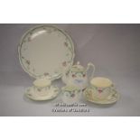 A 1920's tea set for one, comprising teapot, tray, cup and saucer plate, sugar and cream,