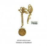 Half sovereign pendant mounted in 9ct gold, on an 18ct gold chain, length 45cm, total weight 14.1