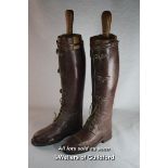 A good pair of vintage brown leather riding boots with lace and buckle fronts, complete with