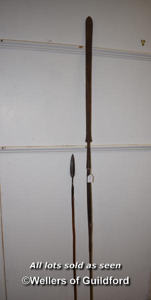 Two African spears, one ith wooden sssshaft and iron tip, 122cm; the other 204cm.