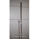 Two African spears, one ith wooden sssshaft and iron tip, 122cm; the other 204cm.