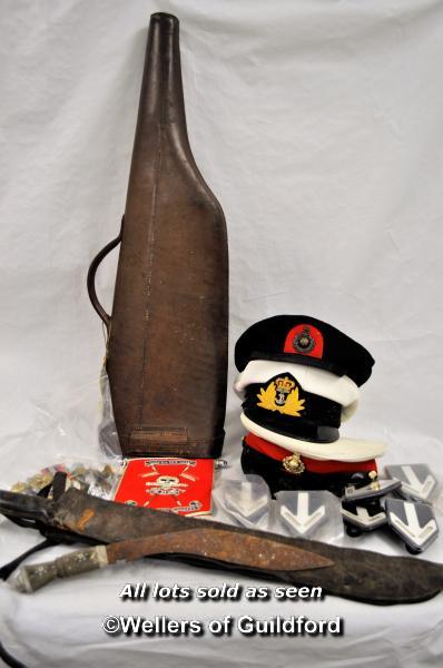 A collection of military items including a Royal Marines recrute Berrai, Royal Marines officers cap,