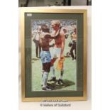 Pele: a framed photo of football legend Pele with Bobby Moore, signed in pen by Pele, with COA