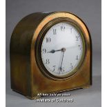 A small French brass mantel clock with arched top, the white enamel dial 8.5cm.