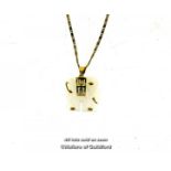 Quartz elephant pendant with gold coloured detail