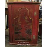 A chinoiserie decorated hanging corner cupboard with single door eclosing two shaped shelves, 87.