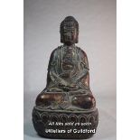 A Chinese cast metal figure of buddha, 24cm.