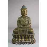 A Chinese bronze figure of a buddha seated on a lotus flower, 17cm.