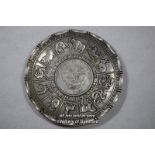 A Chinese coin dish decorated with signs of the zodiac.