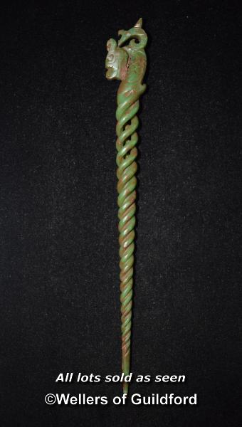 A Chinese jade hairpin with open spiral carving.