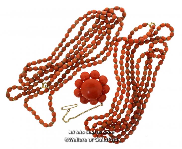 Two coral necklaces with yellow metal clasps stamped 9ct, length of each 123cm, and a coral brooch