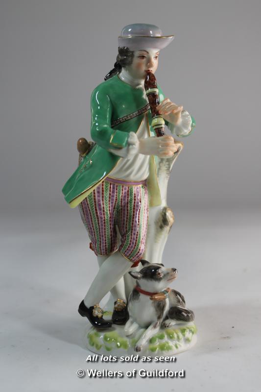 Meissen figure of a man leaning on a tree stump playing a musical instrument, a dog at his feet,