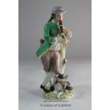 Meissen figure of a man leaning on a tree stump playing a musical instrument, a dog at his feet,