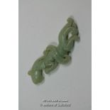 A Chinese hardstone pendant carved as a phoenix, 8cm long.