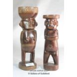 Tribal art: Trobriand Islands, Papua New Guinea, two carved figures, one carrying an open bowl on