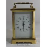 A French brass carriage clock, the white enamel dial signed Bayard