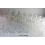 A quantity of glassware to include stem ware and tumblers, two water jugs, baluster vase, pair of